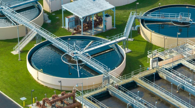 aerial-view-water-treatment-factory-city-wastewater-cleaning-facility-purification-process-removing-undesirable-chemicals-suspended-solids-gases-from-contaminated-liquid.webp