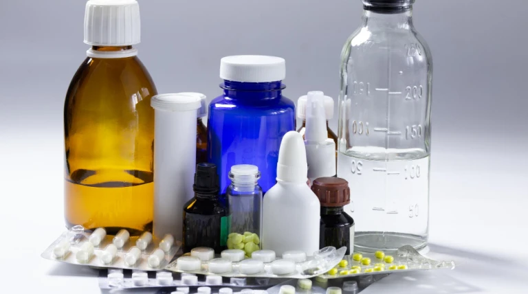 bunch-used-medial-bottles-tablets-gray-background-e6wy9-hzpcl.webp