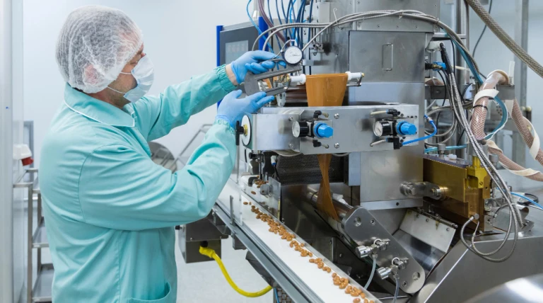 pharmaceutical-technician-sterile-environment-working-with-equipment-pharmacy-industry.webp