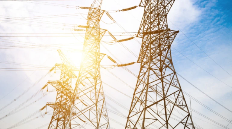 sun-setting-silhouette-electricity-pylons-ojri0-uiuab.webp